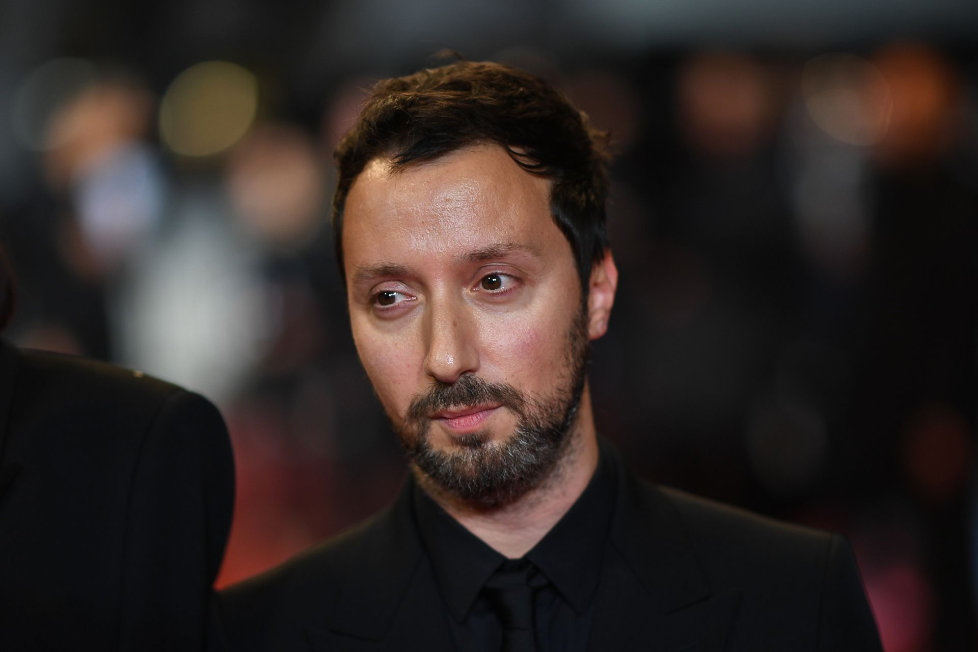 Belgian stylist and producer Anthony Vaccarello arrives for the screening of the film "Lux Aeterna" at the 72nd edition of the Cannes Film Festival in Cannes, southern France, on May 18, 2019. (Photo by LOIC VENANCE / AFP)