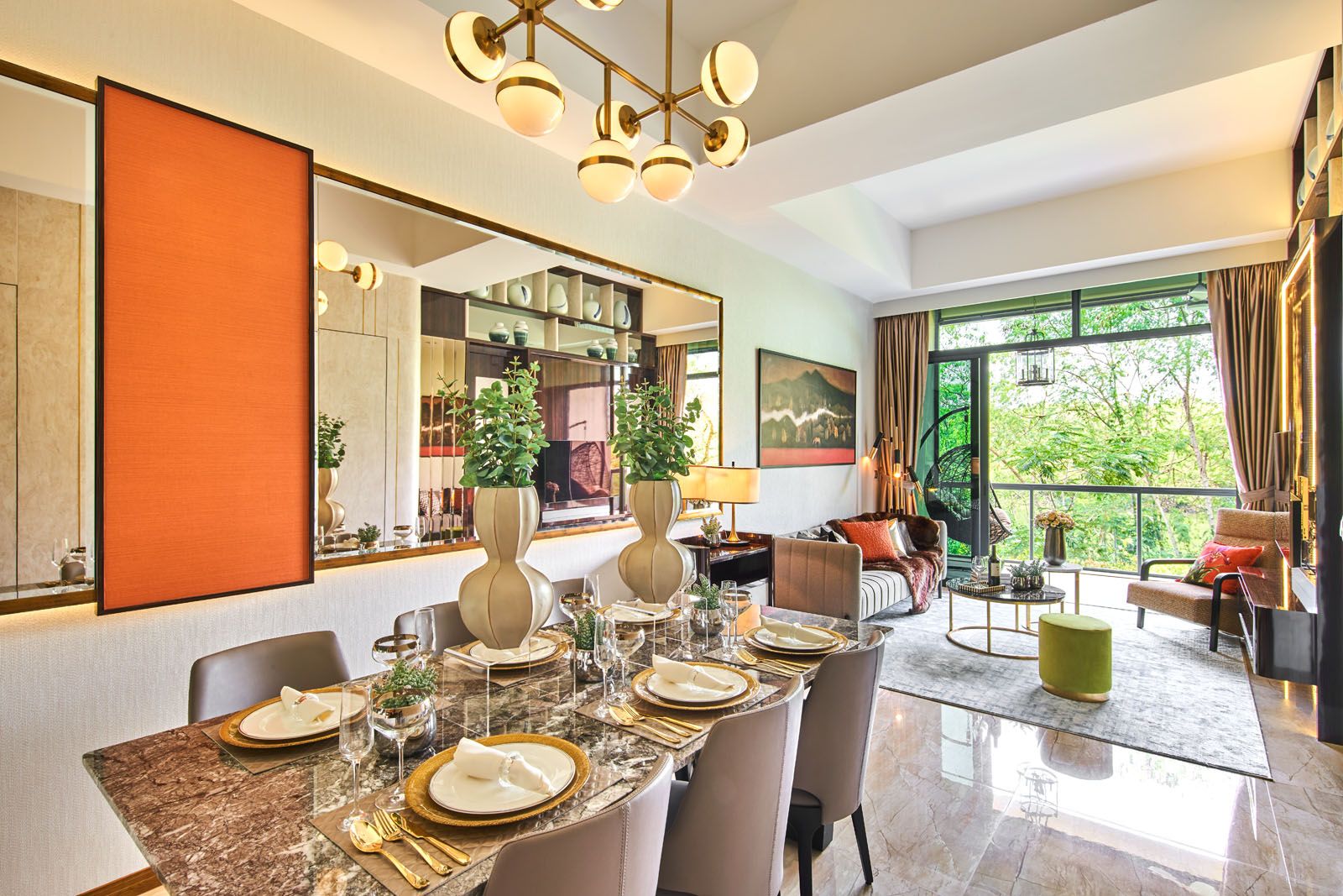 Orange wall panels and accent cushions liven up the living and dining area of this home