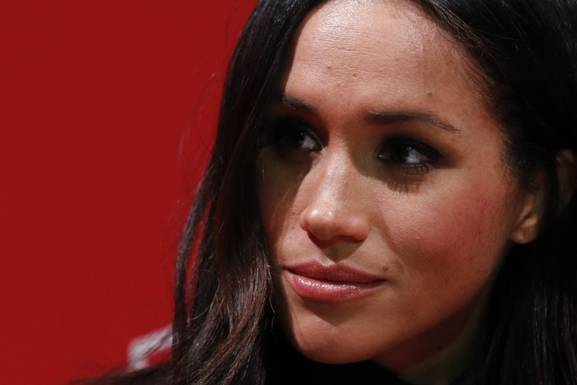 (FILES) In this file photo taken on December 01, 2017 Britain's Prince Harry's fiancee US actress Meghan Markle gestures as they tour the Terrence Higgins Trust World AIDS Day charity fair at Nottingham Contemporary in Nottingham, central England, on December 1, 2017. - Meghan Markle has revealed she suffered a miscarriage in July this year, writing in the New York Times on November 25, 2020 of the deep grief and loss she endured with her husband Prince Harry. (Photo by Adrian DENNIS / various sources / AFP