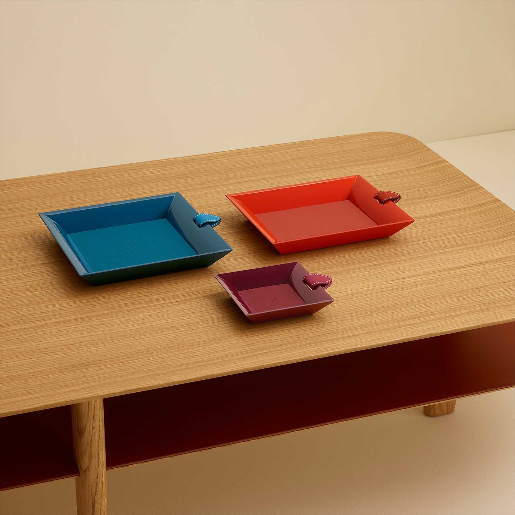 Atrium trays, from <a href="https://www.hermes.com/sg/en/product/atrium-rectangular-change-tray-H313062Mv01/" target="_blank" rel="noopener">Hermes</a>