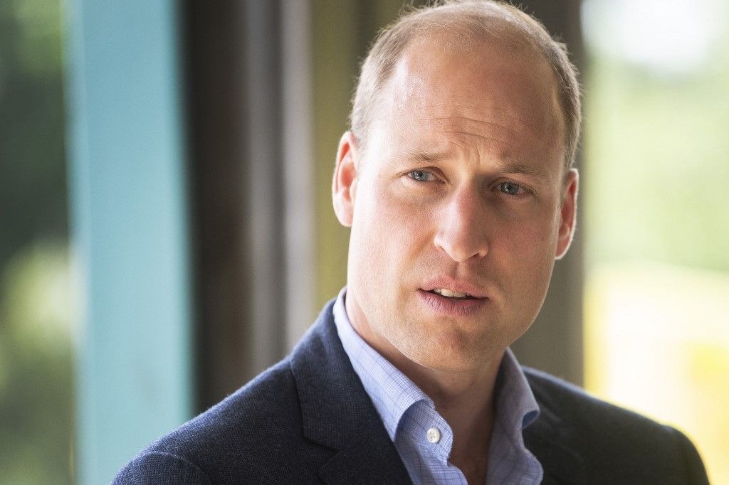 Britain's Prince William, Duke of Cambridge observes social distancing as he meets paramedic staff of the England Ambulance Service Trust at the Ambulance Station in King's Lynn, Norfolk on June 16, 2020. (Image: Victoria Jones/AFP)
