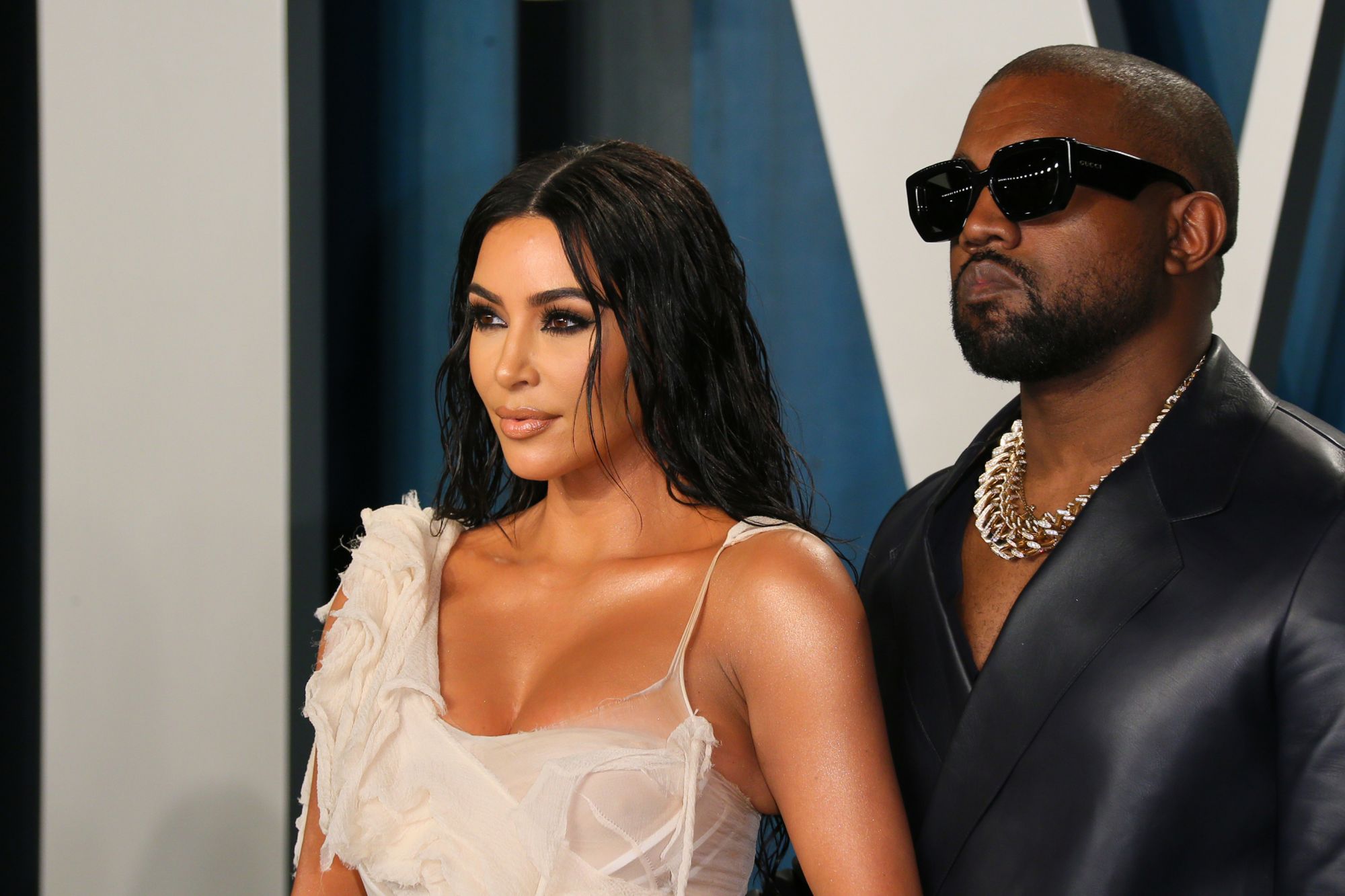 US media personality Kim Kardashian (L) and husband US rapper Kanye West attend the 2020 Vanity Fair Oscar Party following the 92nd Oscars at The Wallis Annenberg Center for the Performing Arts in Beverly Hills on February 9, 2020. (Photo by Jean-Baptiste Lacroix / AFP)