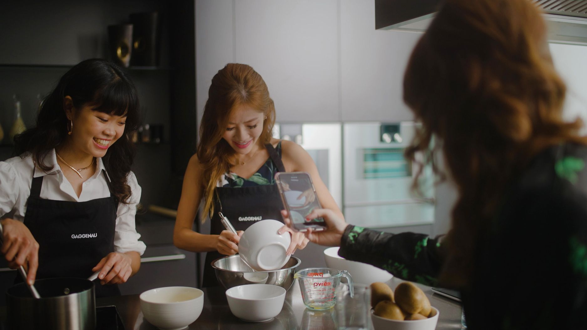 Cheryl Cheong, Samantha Tay and Liyann Seet in a Gaggenau Kitchen