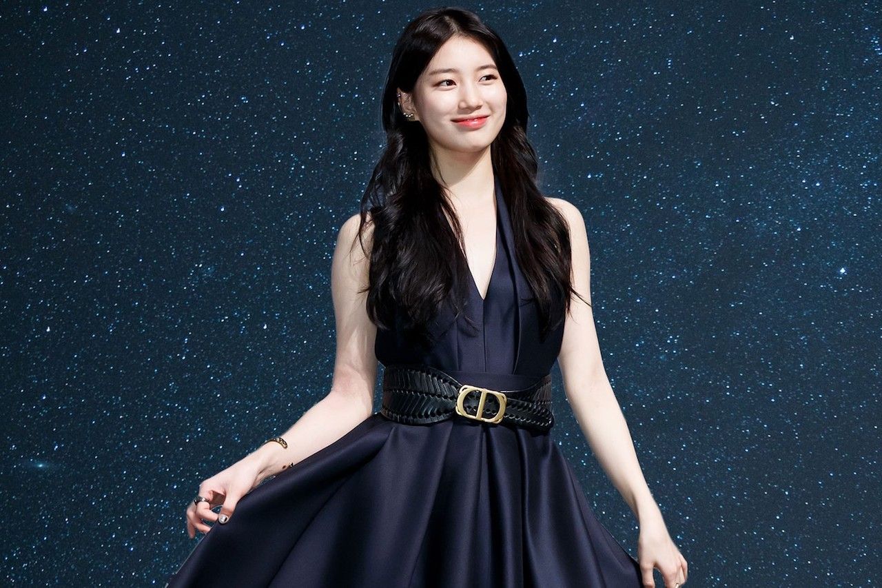 Looking glitzy in Dior (what else?) at an event.