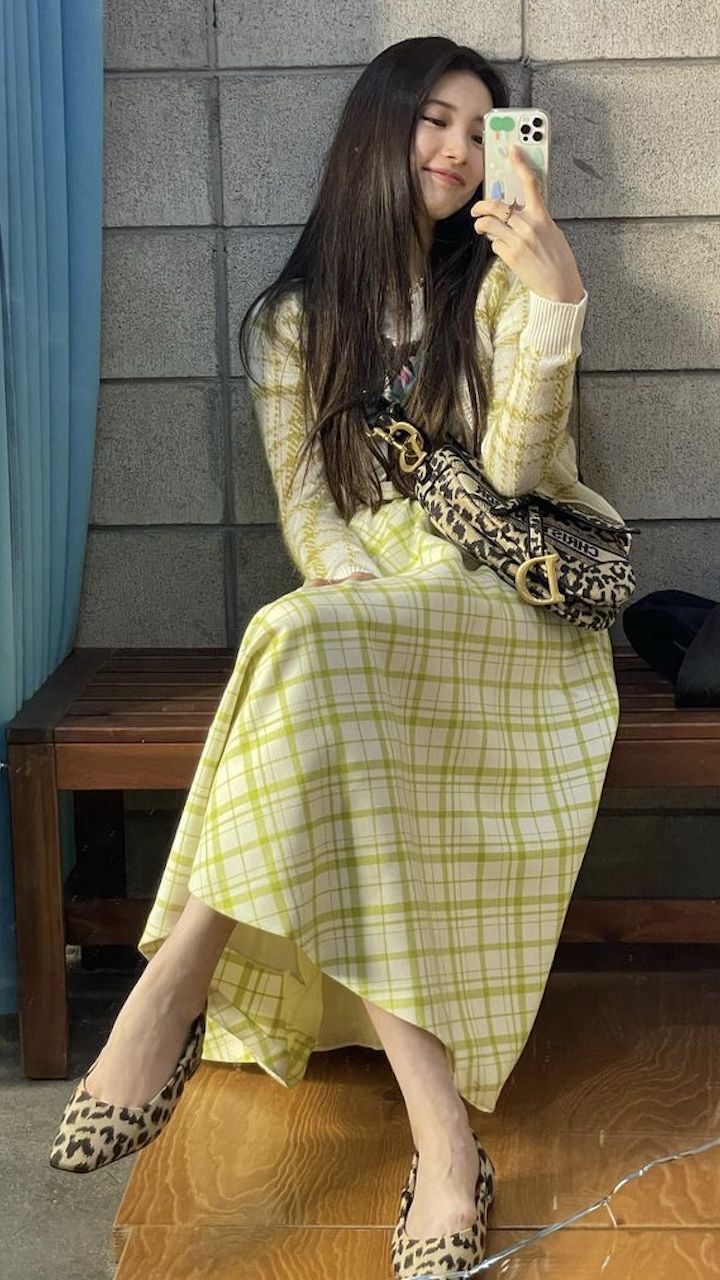 Taking a cheeky selfie while wearing Dior.