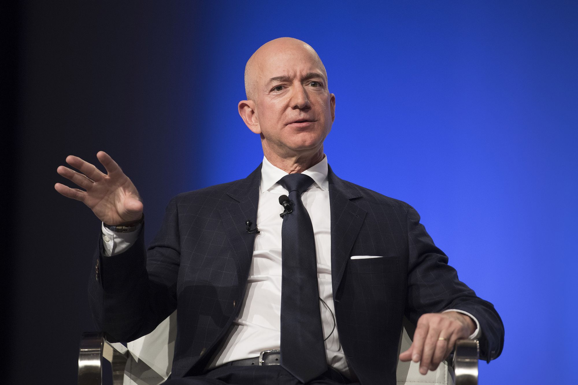 Amazon and Blue Origin founder Jeff Bezos provides the keynote address at the Air Force Association's Annual Air, Space & Cyber Conference in Oxen Hill, MD, on September 19, 2018. / AFP PHOTO / Jim WATSON