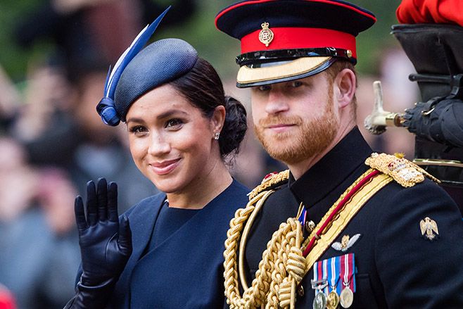 Prince Harry and Meghan ride by carriage down the Mall during Trooping The Colour parade. Photo: Samir Hussein/Samir Hussein/WireImage