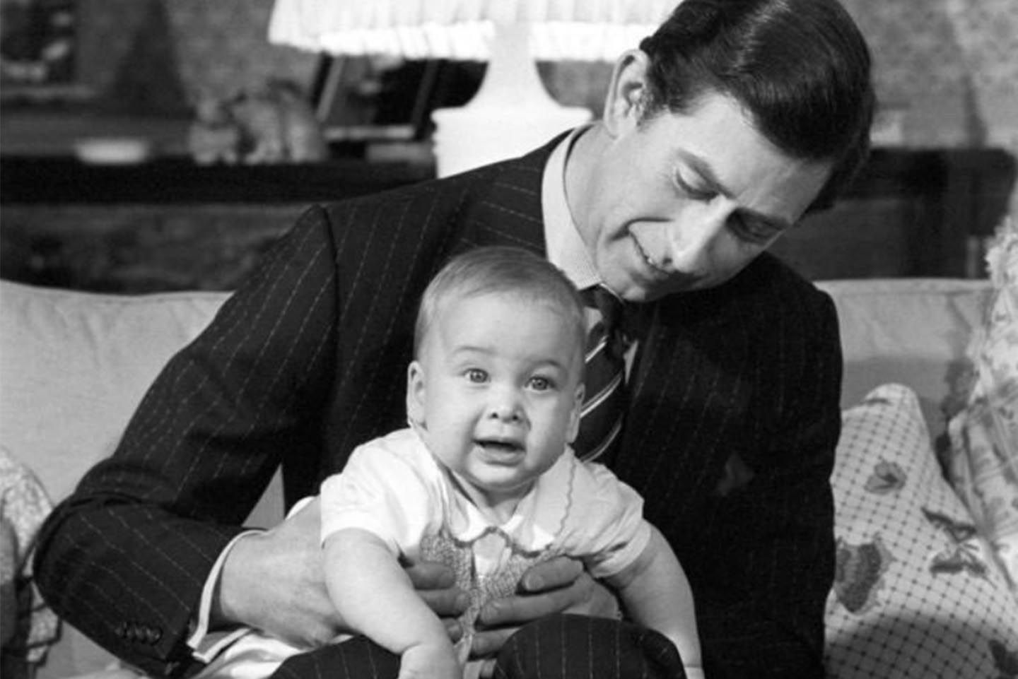 In honour of Prince William's birthday, The Prince of Wales and The Duchess of Cornwall shared a photo of a young Prince William on the lap of his father. Photo: The Prince of Wales and The Duchess of Cornwall/Twitter