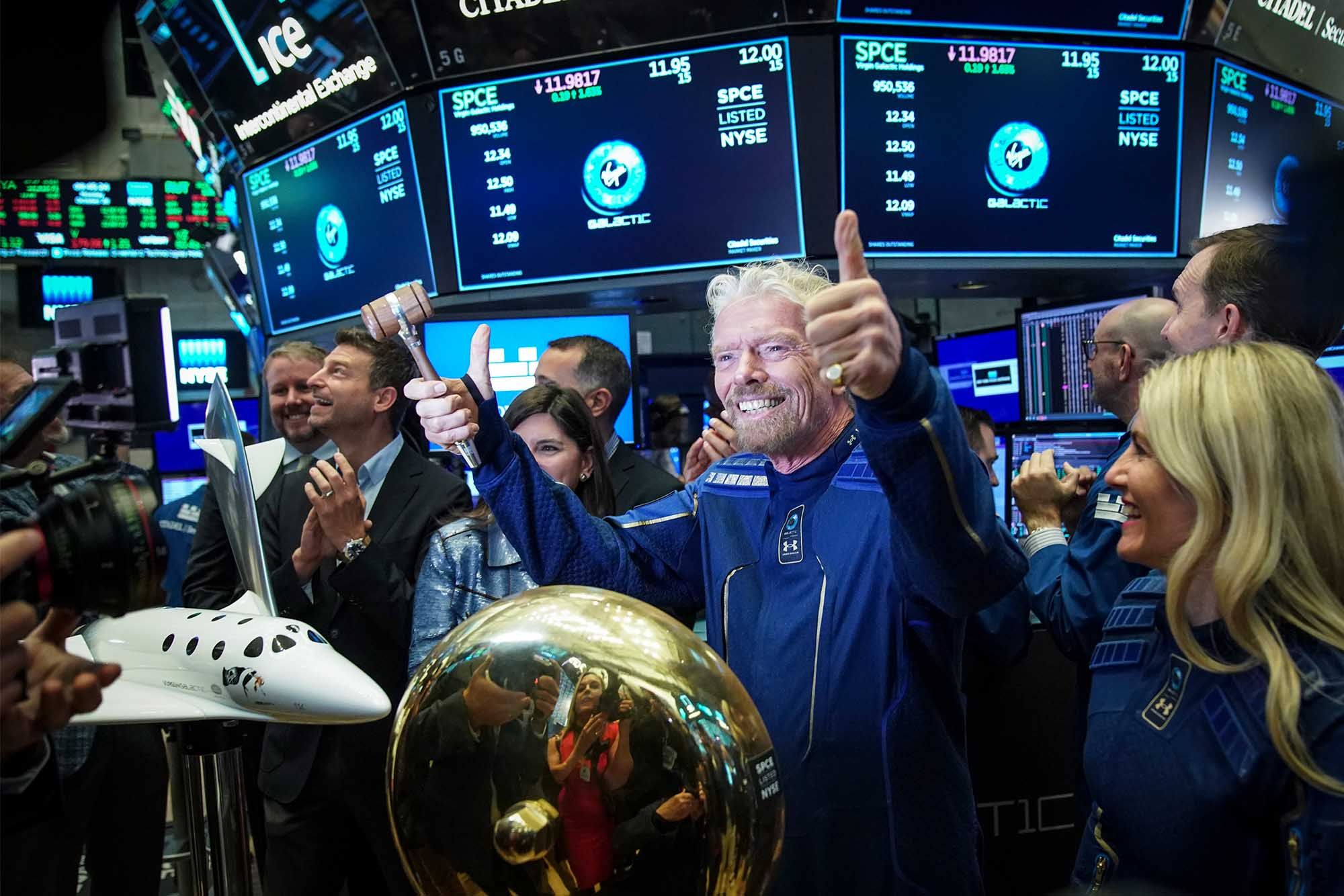 Sir Richard Branson, Founder of Virgin Galactic, gives the thumbs up after ringing a ceremonial bell on the floor of the New York Stock Exchange. (Photo: Getty Images)