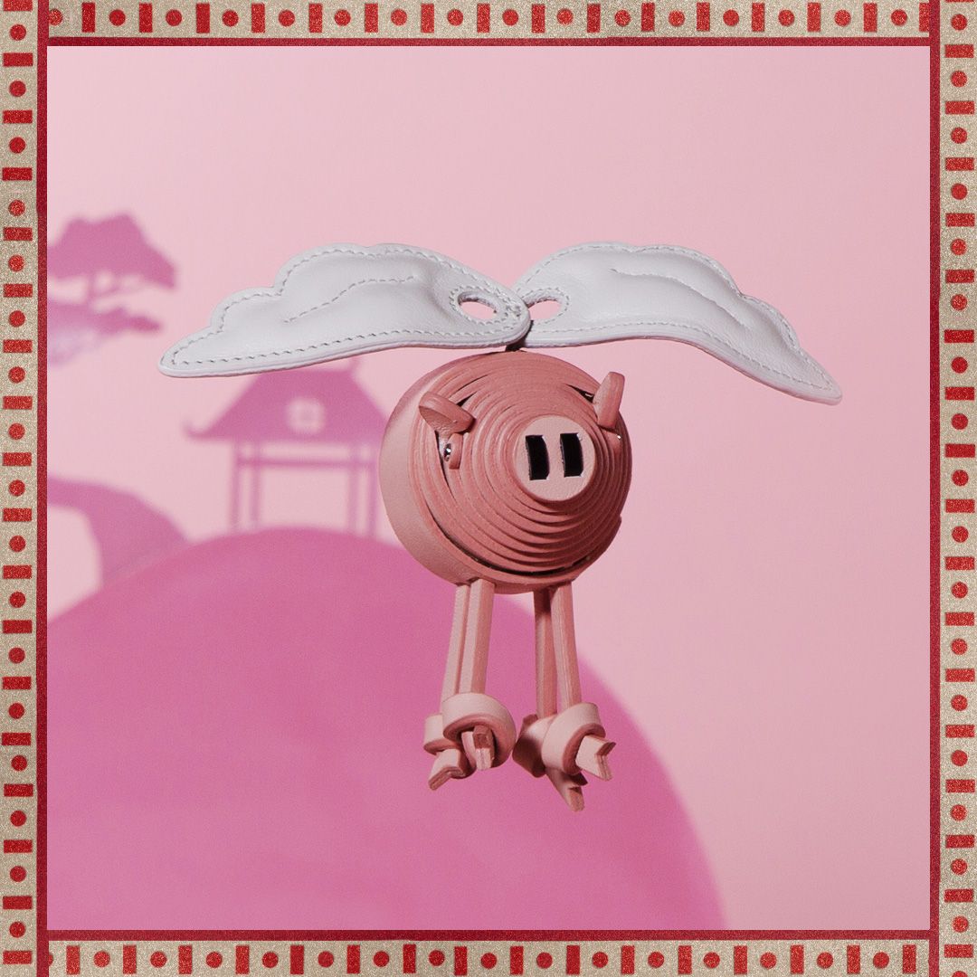 TOD'S 2019 新年限定飛天粉紅豬皮革吊飾。