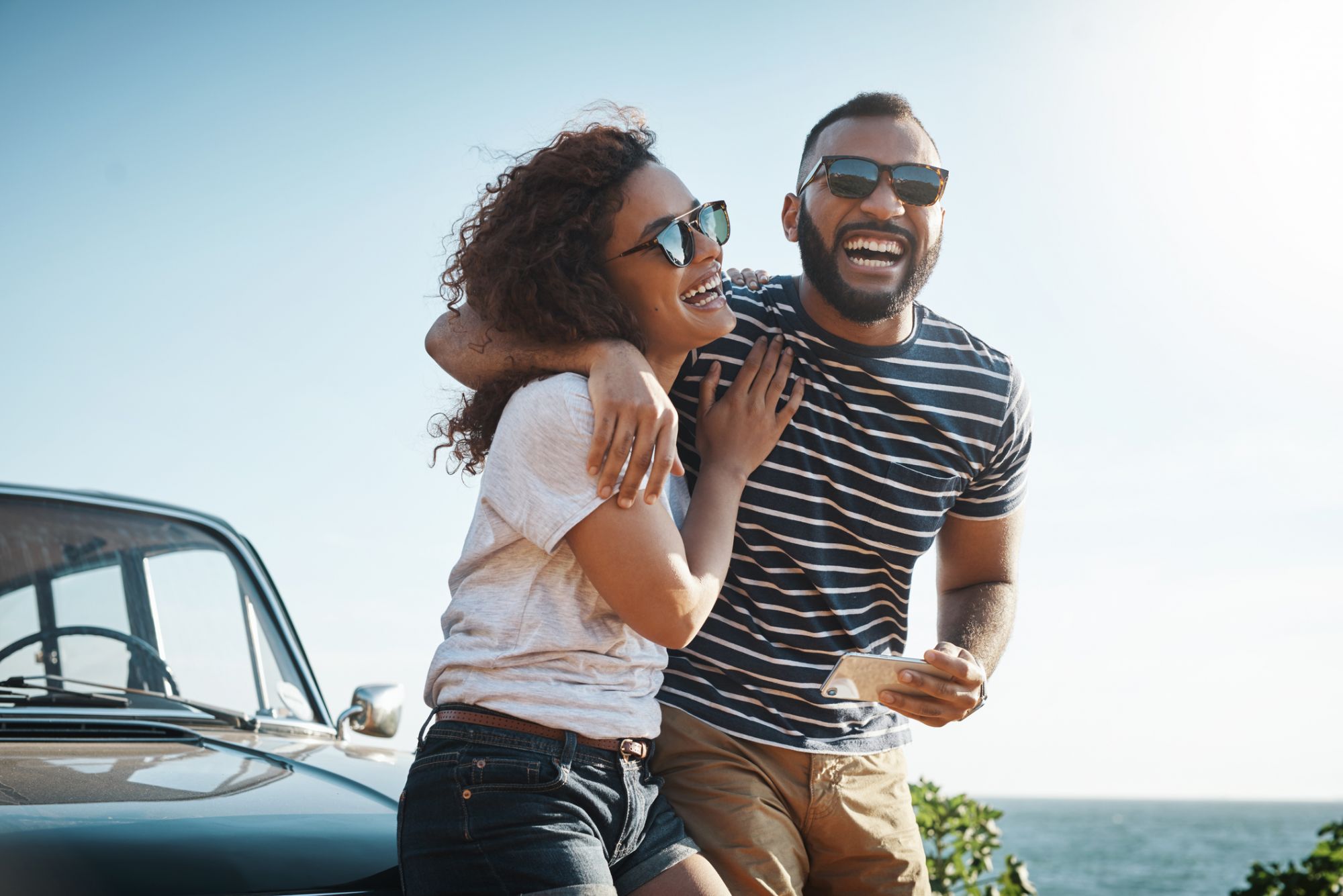 Shot of a young couple enjoying a summerâs road trip together