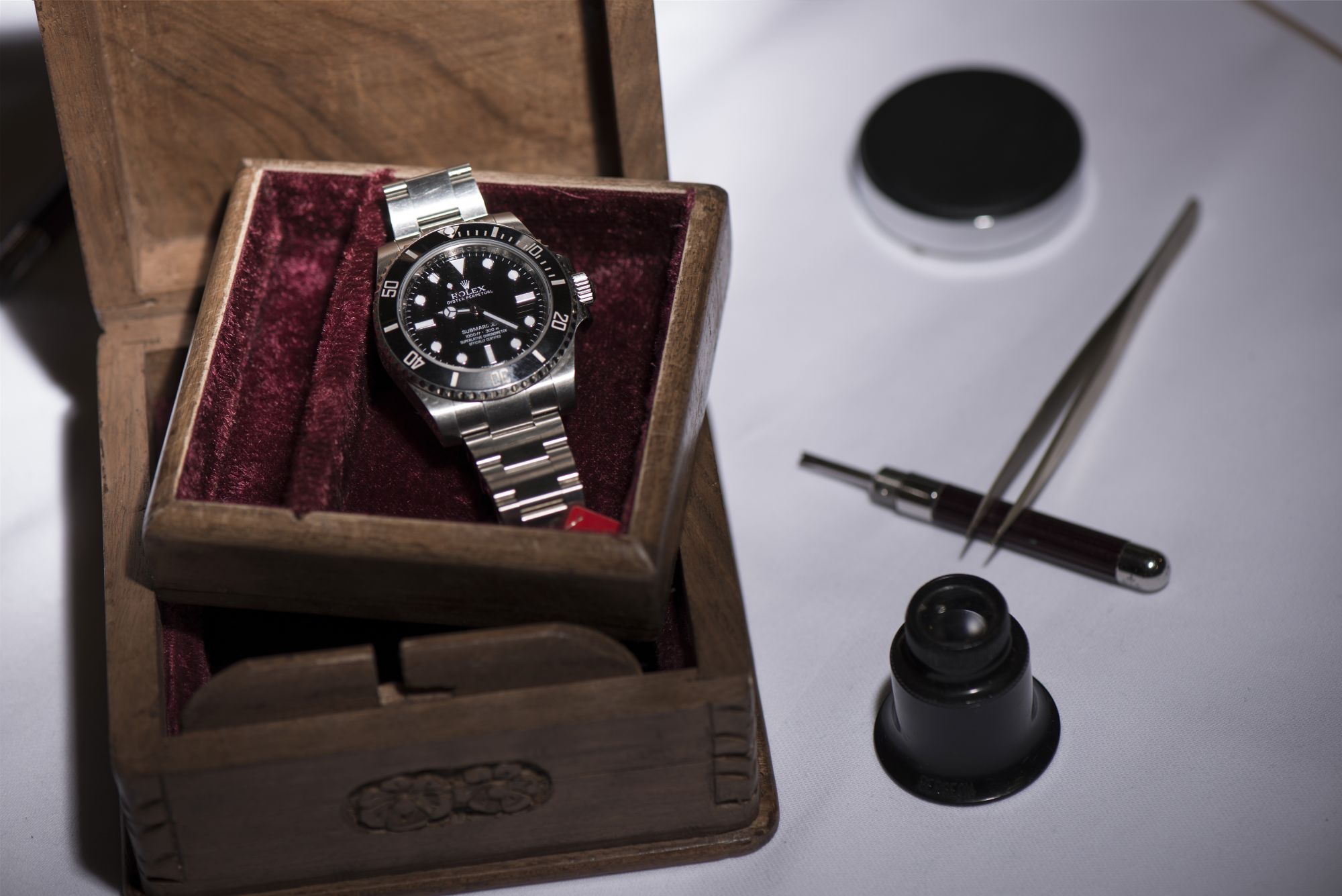 GENEVA, SWITZERLAND - NOVEMBER 06: A Rolex Submariner wristwatch worn by explorer Mike Horn during his ascent of Mount Makalu expected to fetch between 21'000 to 41'000 USD is shown during a press preview at the auction house Christie's on November 6, 2015 in Geneva, Switzerland. (Photo by Harold Cunningham/Getty Images)