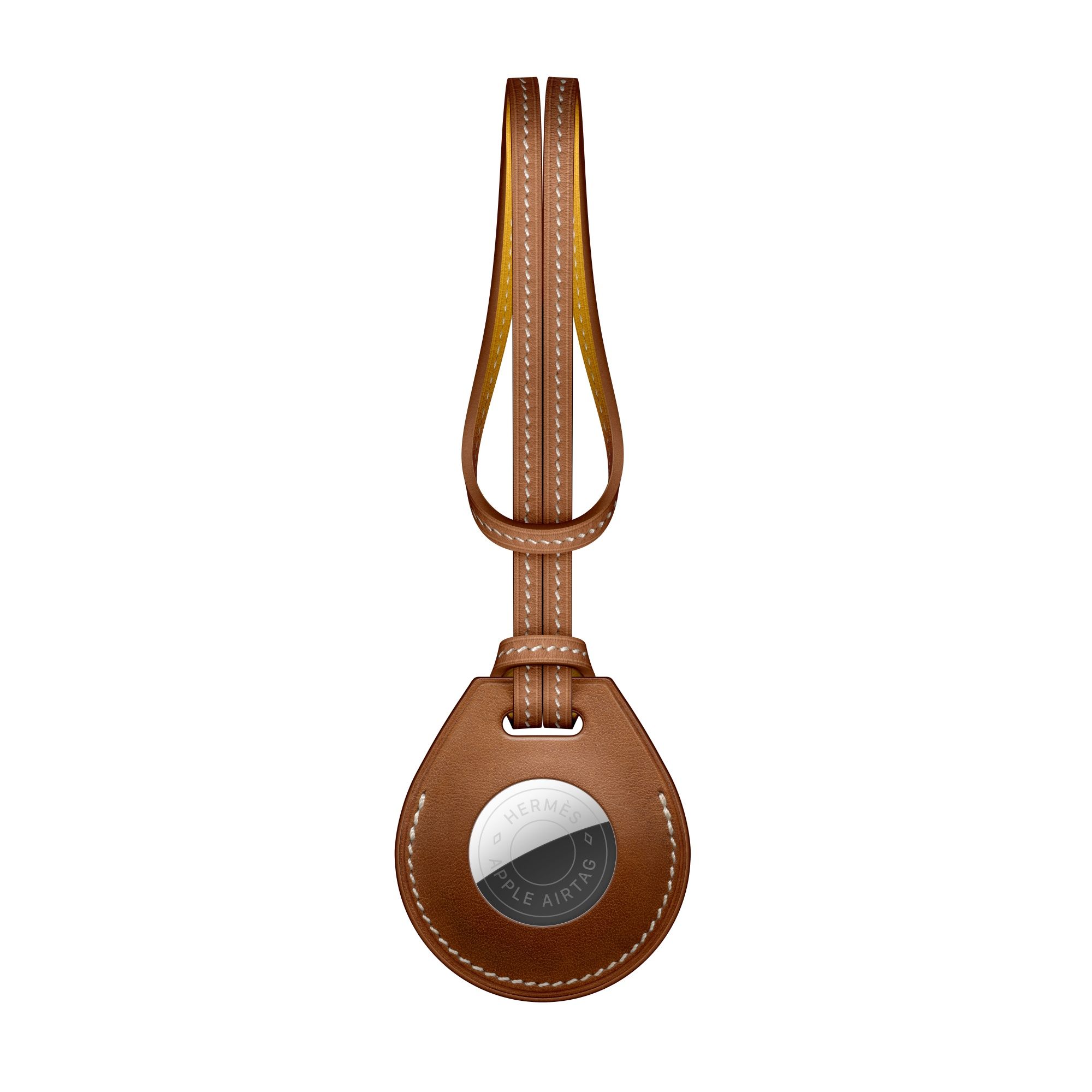 Apple AirTag Hermès 系列 Barénia 小牛皮皮包掛飾(琥珀色淺黃褐色),建議售價 NT$8,990