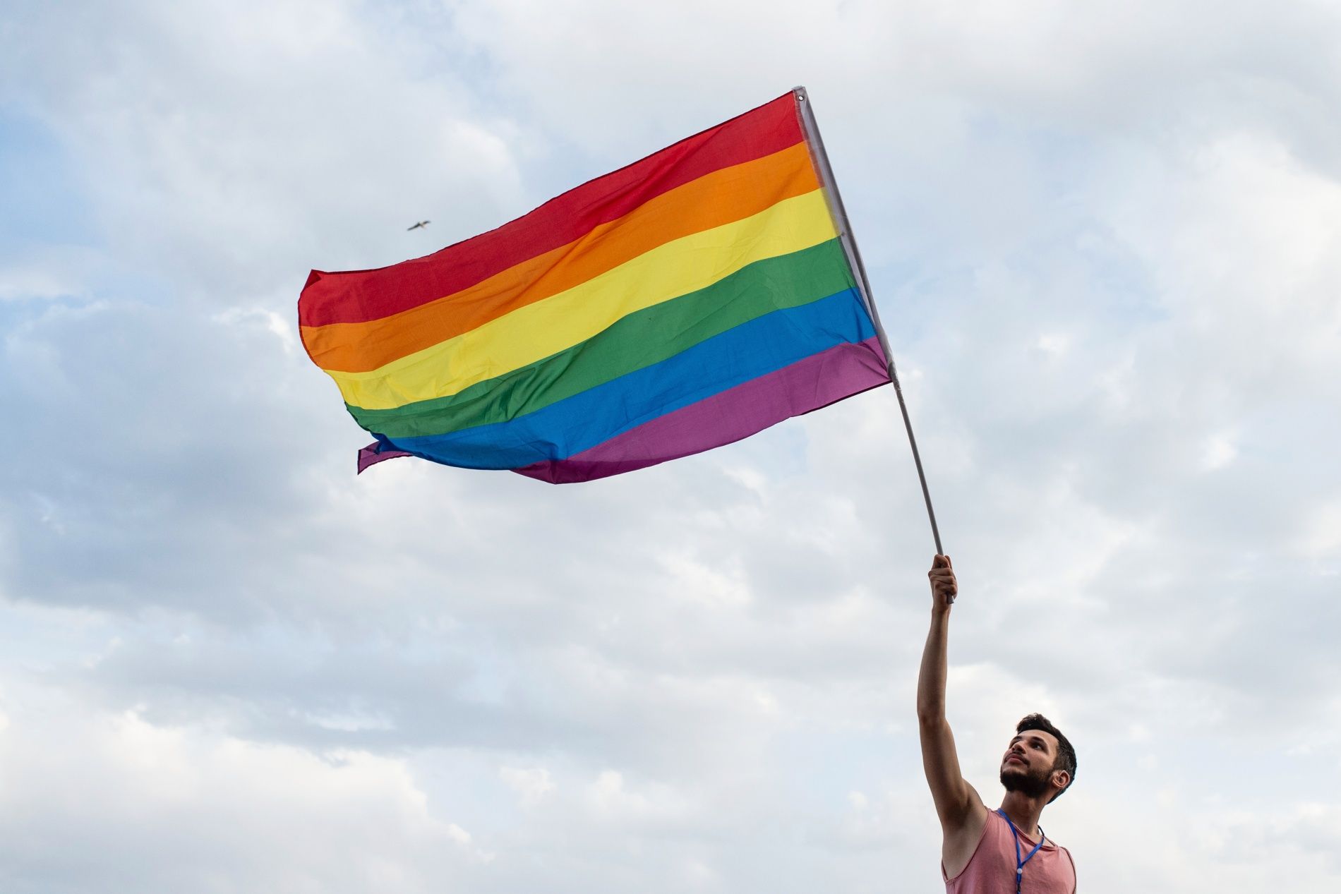 NAPLES, ITALY - JUNE 22: An activist of the LGBT movement with a flag during the 12th Mediterranean Pride of Naples on June 22, 2019 in Naples, Italy. The Mediterranean Pride of Naples is one of the many events of Pride Month scheduled in Italy and around the world, inspired by the Stonewall riots of 1969, when protests and clashes between police and homosexual groups took place in New York, symbolically the moment of birth of the modern gay liberation movement throughout the world. (Photo by Ivan Romano/Ge