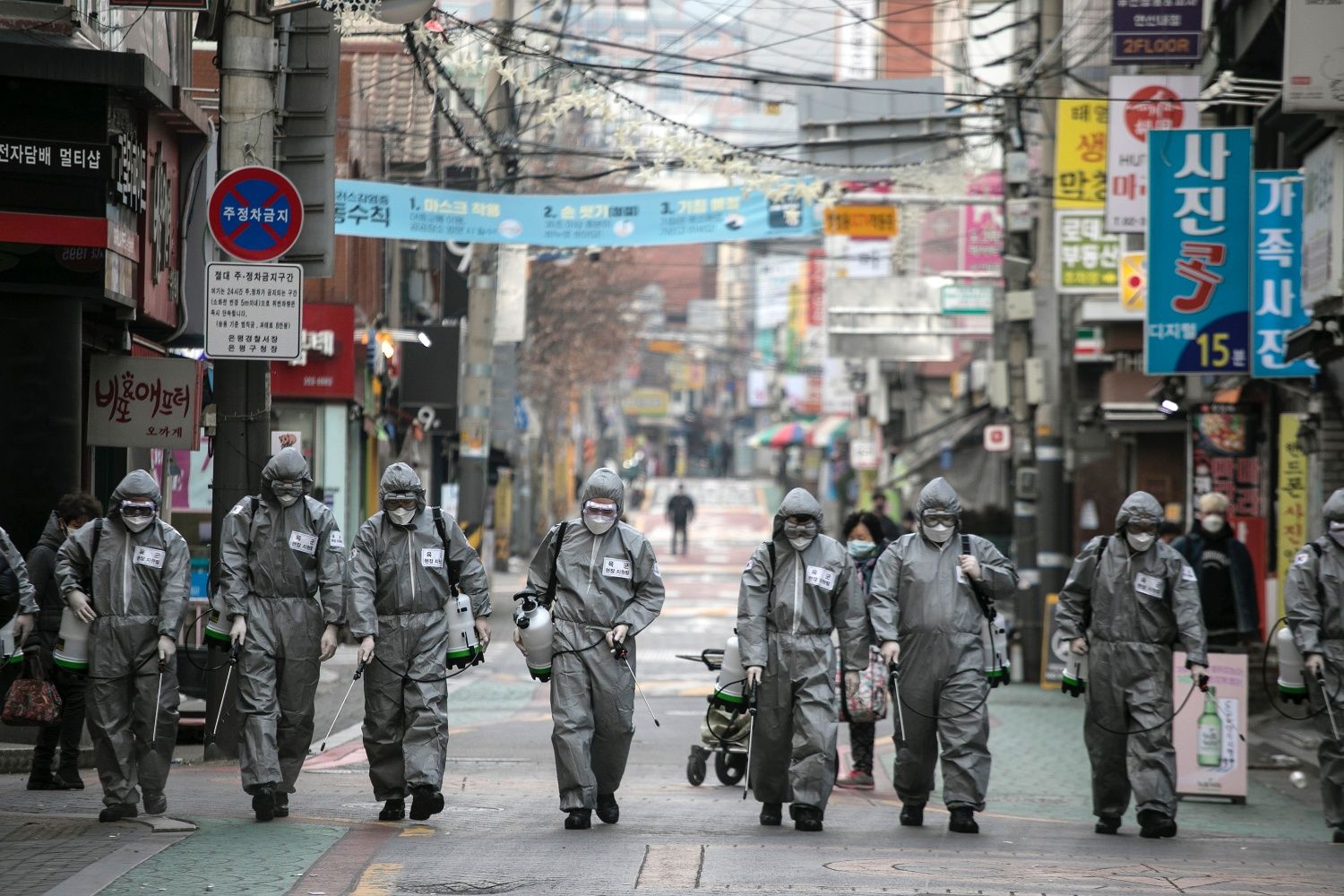 SEOUL, SOUTH KOREA - MARCH 04: South Korean soldiers, in protective gear, disinfect the Eunpyeong district against the coronavirus (COVID-19) on March 04, 2020 in Seoul, South Korea. The South Korean government has raised the coronavirus alert to the "highest level" as confirmed case numbers continue to rise across the country. According to the Korea Centers for Disease Control and Prevention, 516 new cases were reported on Wednesday, with the death toll rising to 33. The total number of infections in the n