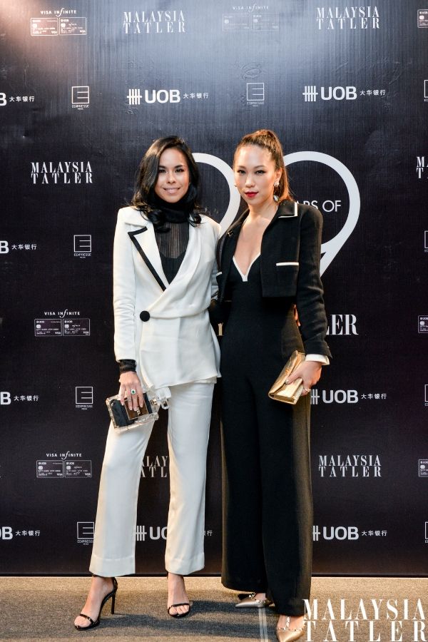 Kim Raymond in Afiq M and Diane Chia in vintage Chanel