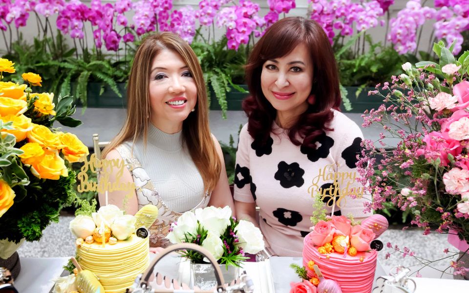 Birthday girls Lee Jim Leng and Vivienne Cheng