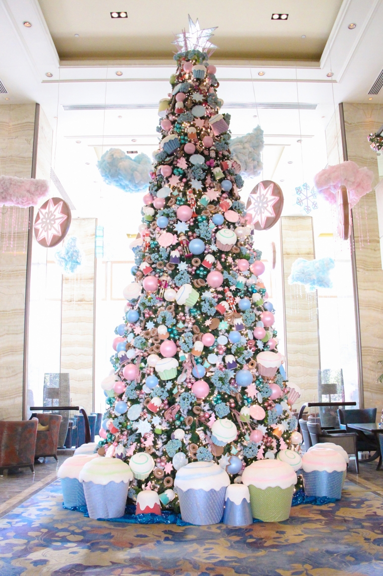 this years tree displays candy inspired holiday dcor filled with pastel colors of life sized candies and sweet confections that remind guests of their - Candyland Christmas Tree Decorations this years tree displays candy inspired holiday dcor filled with pastel colors of life sized candies and sweet confections that remind guests of their - Candyland Christmas Tree Decorations