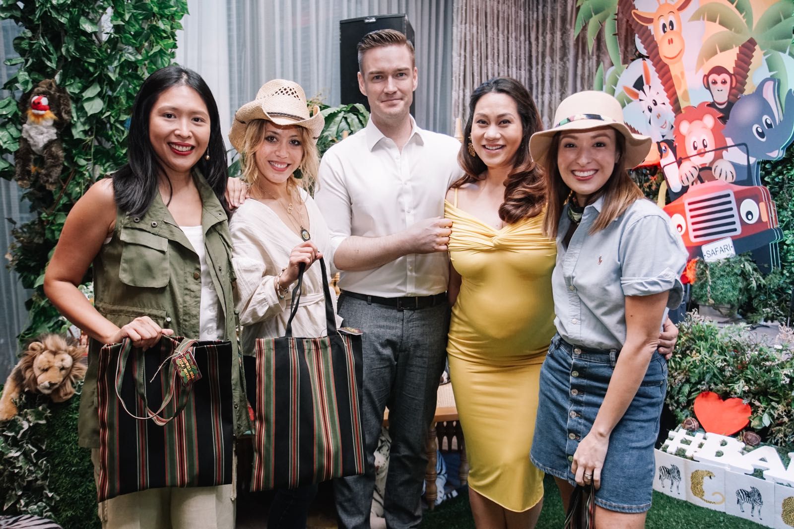 Winners of the first game Marielle Santos-Po, Shauna Jay Popple Williams and Nicole Hernandez de Los Angeles with the parents-to-be