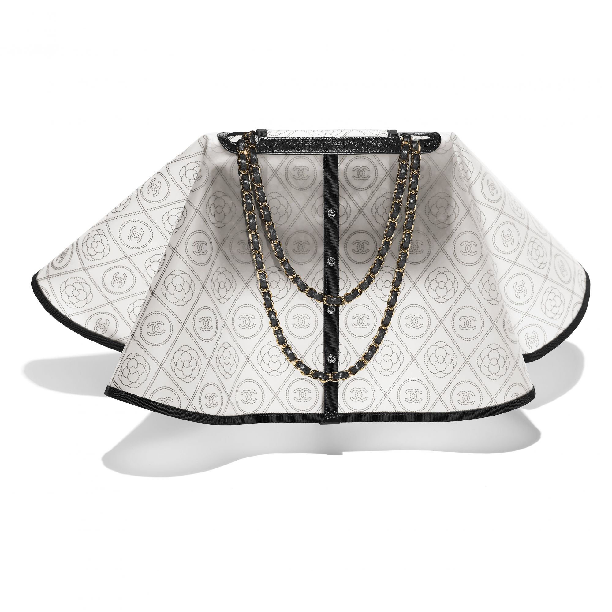 Black and white bag in printed PVC, grosgrain and leather