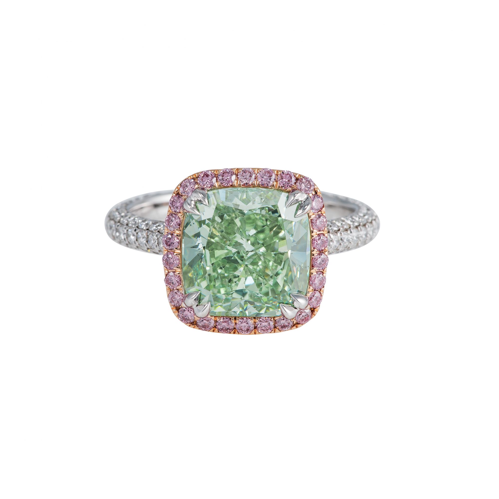 Ring with cushion-shaped fancy intense green diamond weighing over 4.50ct and 26 round fancy intense purplish pink diamonds
