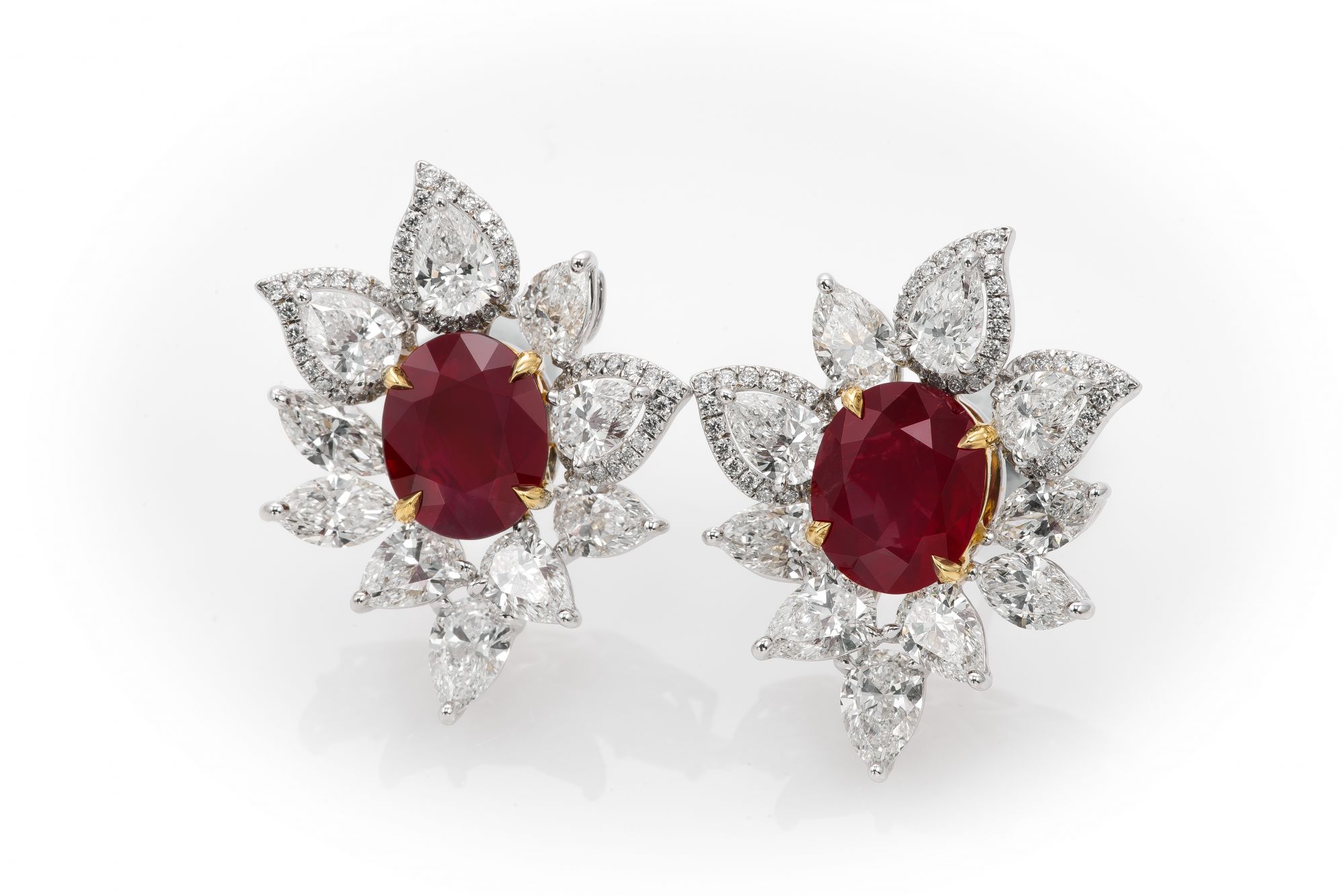 Earrings with two oval Burmese rubies totalling nearly 7ct